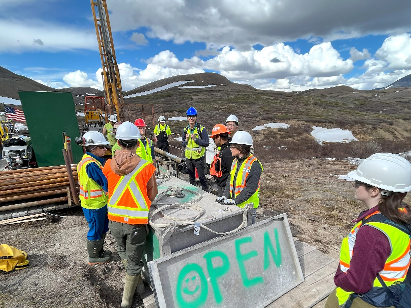 A group of engineers speaking on site
